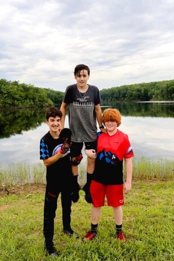 Crosby (left) and Milo (right) lifting Lucas